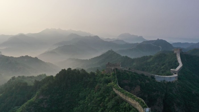 CHENGDE, CHINA - JUNE 01: Aerial view of Jinshanling section of the Great Wall shrouded in morning mist on June 1, 2023 in Luanping County, Chengde City, Hebei Province of China. (Photo by VCG/VCG via Getty Images)
