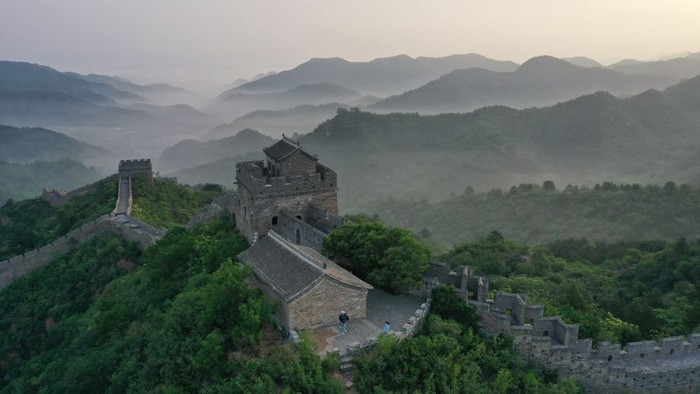 CHENGDE, CHINA - JUNE 01: Aerial view of Jinshanling section of the Great Wall shrouded in morning mist on June 1, 2023 in Luanping County, Chengde City, Hebei Province of China. (Photo by VCG/VCG via Getty Images)