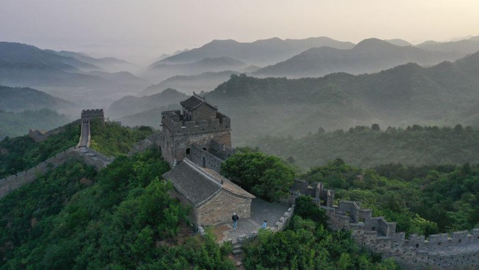 CHENGDE, CHINA - JUNE 01: Aerial view of Jinshanling section of the Great Wall shrouded in morning mist on June 1, 2023 in Luanping County, Chengde City, Hebei Province of China. (Photo by VCG/VCG via Getty Images)