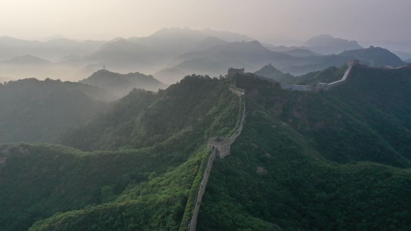 CHENGDE, CHINA - JUNE 01: Aerial view of Jinshanling section of the Great Wall shrouded in morning mist on June 1, 2023 in Luanping County, Chengde City, Hebei Province of China. (Photo by VCG/VCG via Getty Images)