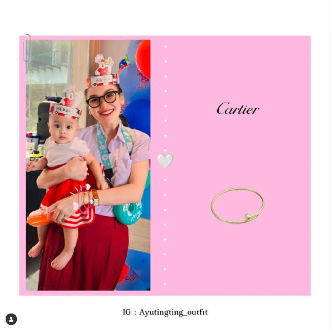 Ayu Ting Ting terlihat imut memakai seragam SD dan membawa botol minum sambil menggendong keponanakannya. Gayanya ini membuat salah fokus karena gelang yang dikenakannya. Menurut unggahan Ayutinting Outfit, pelantun lagu Alamat Palsu itu tampil dengan gelang Cartier seharga Rp 53 juta. Foto: Dok. Instagram