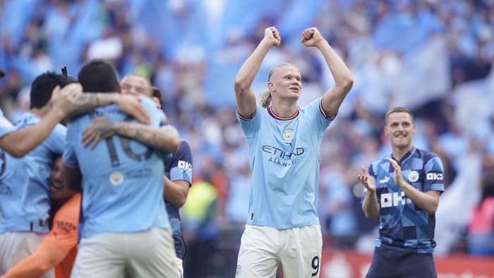 Manchester Citys Erling Haaland celebrates winning the English FA Cup final soccer match between Manchester City and Manchester United at Wembley Stadium in London, Saturday, June 3, 2023. Manchester City won 2-1. (AP Photo/Dave Thompson)