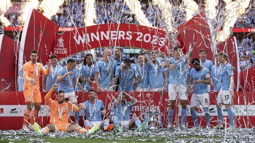 Manchester City players celebrate after winning the English FA Cup final soccer match between Manchester City and Manchester United at Wembley Stadium in London, Saturday, June 3, 2023.(AP Photo/Jon Super)