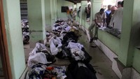 Penampakan sejumlah jenazah yang tergeletak di salah satu ruang terbuka di sekolahan setempat, India, Minggu (4/6/2023).