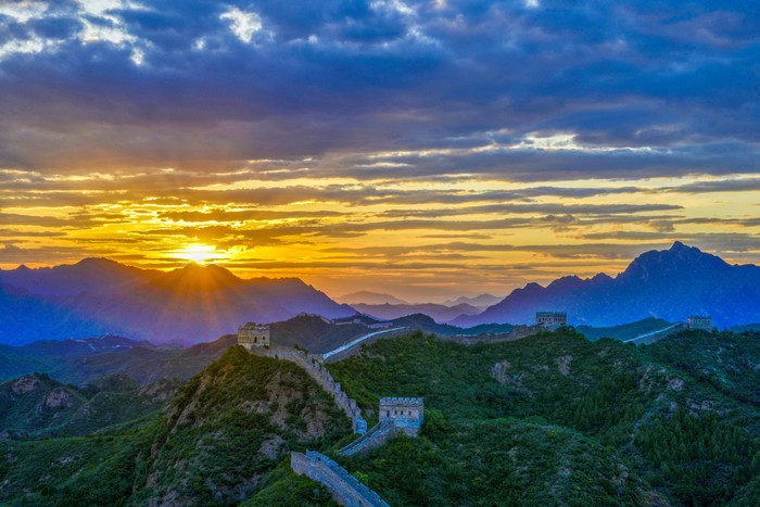 CHENGDE, CHINA - JUNE 04: Aerial view of the sunset scenery of the Jinshanling Great Wall on June 4, 2023 in Chengde, Hebei Province of China. (Photo by VCG/VCG via Getty Images)