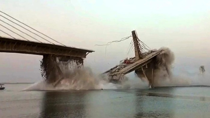 This photo taken on June 4, 2023, shows an under construction bridge collapsing into the river Ganges in Bhagalpur district in Indias eastern state of Bihar. (Stringer/AFP/Getty Images)