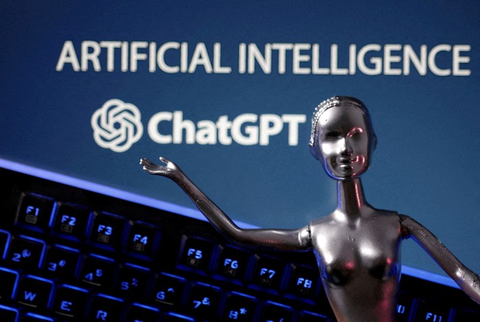 FILE PHOTO: ChatGPT logo and AI Artificial Intelligence words are seen in this illustration taken, May 4, 2023. REUTERS/Dado Ruvic/Illustration///File Photo