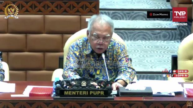Menteri PUPR Basuki Hadimuljono saat rapat kerja dengan Komisi V DPR RI. (Tangkapan Layar Youtube Komisi V DPR RI Channel)