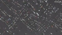Pandangan udara kota Oleshky yang terendam banjir di Ukraina, Rabu (7/6/2023). (Satellite image ©2023 Maxar Technologies via AP) 