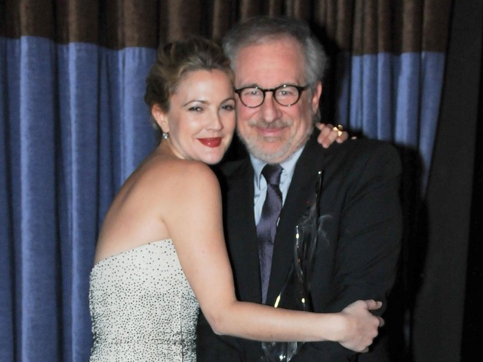 (EXCLUSIVE, Premium Rates Apply) BEVERLY HILLS, CA - DECEMBER 09:  Actress Drew Barrymore (L) embraces director Steven Spielberg (R) at the ADL Los Angeles Dinner Honoring Steven Spielberg at The Beverly Hilton Hotel on December 9, 2009 in Beverly Hills, California.  (Photo by Michael Kovac/WireImage)
