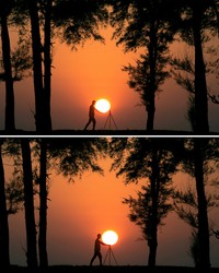 Foto siluet Matahari terbenam