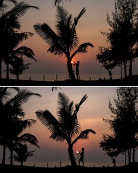 Foto siluet Matahari terbenam