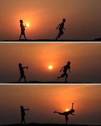 Foto siluet Matahari terbenam