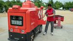 Mobil Tanpa Sopir Mondar-mandir Antar Barang di China