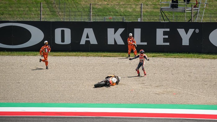 SCARPERIA, ITALY - JUNE 11: Marc Marquez of Spain and Repsol Honda Team crashes during the Race of the MotoGP Gran Premio dItalia Oakley at Mugello Circuit on June 11, 2023 in Scarperia, Italy. (Photo by Steve Wobser/Getty Images)