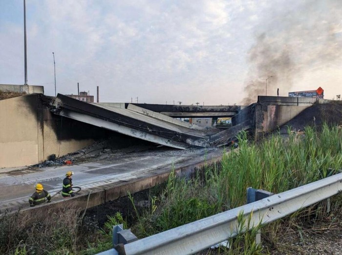 PHILADELPHIA, PA - JUNE 11: In this handout photo provided by the City of Philadelphia Office of Emergency Management, smoke rises from a collapsed section of the I-95 highway on June 11, 2023 in Philadelphia, Pennsylvania. According to reports, a tanker fire underneath the highway caused the road to collapse. City of Philadelphia Office of Emergency Management via Getty Images/AFP (Photo by Handout / GETTY IMAGES NORTH AMERICA / Getty Images via AFP)