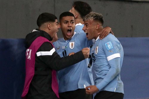 Uruguays forward Luciano Rodriguez (R) celebrates after scoring during the Argentina 2023 U-20 World Cup final match between Uruguay and Italy at the Estadio Unico Diego Armando Maradona stadium in La Plata, Argentina, on June 11, 2023. (Photo by ALEJANDRO PAGNI / AFP) (Photo by ALEJANDRO PAGNI/AFP via Getty Images)