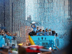 Para pemain Manchester City sudah kembali ke kotanya dan melakukan parade Treble Winners. Kota Manchester pun membiru.  