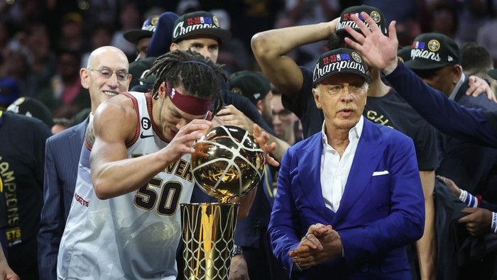 DENVER, COLORADO - JUNE 12: The Denver Nuggets celebrate with the Larry OBrien Championship Trophy after a 94-89 victory against the Miami Heat in Game Five of the 2023 NBA Finals to win the NBA Championship at Ball Arena on June 12, 2023 in Denver, Colorado. NOTE TO USER: User expressly acknowledges and agrees that, by downloading and or using this photograph, User is consenting to the terms and conditions of the Getty Images License Agreement. (Photo by Matthew Stockman/Getty Images)