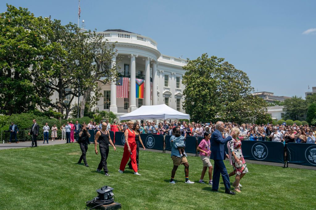 US President Joe Biden, second right, First Lady Jill Biden, right, and singer Betty Who, center, arrive for a Pride Month celebration event at the White House in Washington, DC, US, on Saturday, June 10, 2023. Biden praised the LGBTQ community's courage at what he described as the biggest Pride Month celebration yet at the White House, saying they're an example for the US and the world. Photographer: Nathan Howard/Bloomberg via Getty Images
