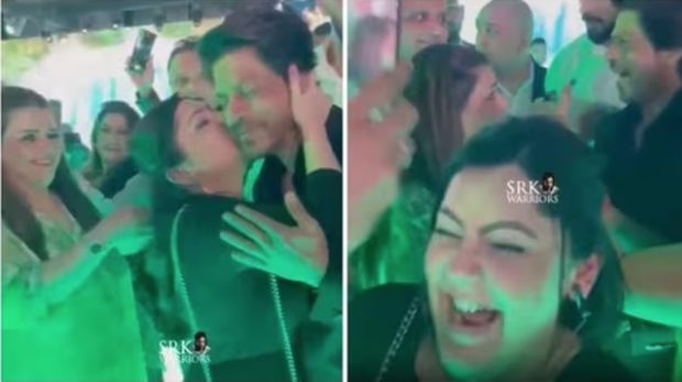 Cuplikan video Shah Rukh Khan saat dicium fans wanita.