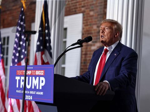 Former U.S. President Donald Trump waves during an event following his arraignment on classified document charges, at Trump National Golf Club, in Bedminster, New Jersey, U.S., June 13, 2023. REUTERS/Amr Alfiky