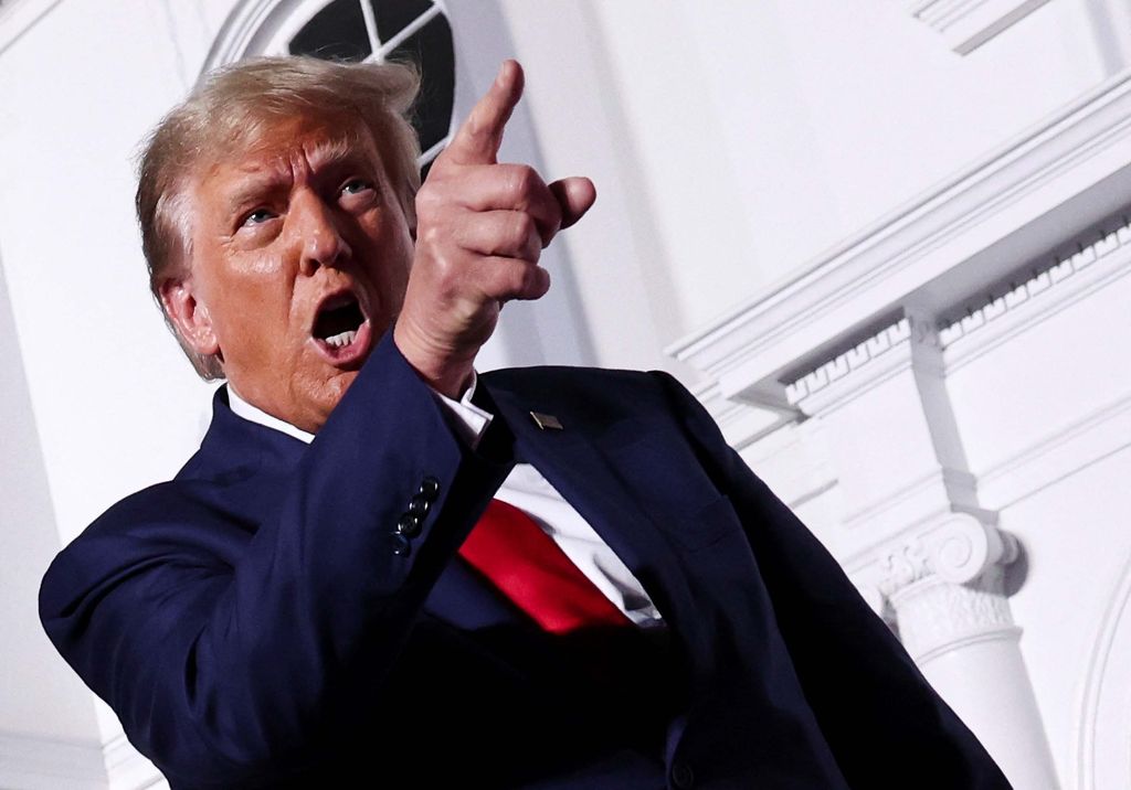 Former U.S. President Donald Trump waves during an event following his arraignment on classified document charges, at Trump National Golf Club, in Bedminster, New Jersey, U.S., June 13, 2023. REUTERS/Amr Alfiky