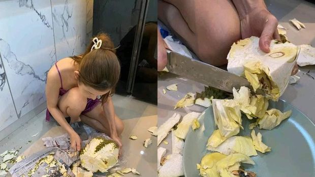 Wanita ini mengupas durian dengan cara yang salah seperti mengupas kelapa