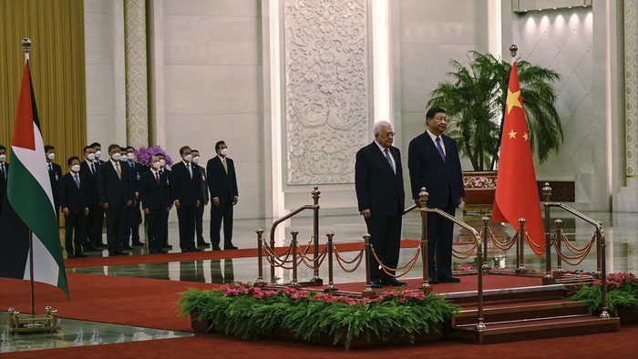 China's President Xi Jinping, right, and Palestinian President Mahmoud Abbas shake hands after a signing ceremony at the Great Hall of the People in Beijing Wednesday, June 14, 2023. (Jade Gao/Pool Photo via AP)