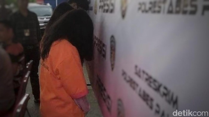 Etri Indahyani, warga asal Lampung tersangka TPPO yang mempekerjakan anah di bawah umur di Palembang.