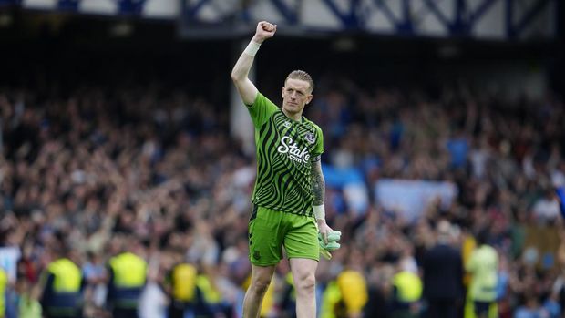 Everton's goalkeeper Jordan Pickford gestures to fans at the end of the English Premier League soccer match between Everton and Manchester City at the Goodison Park stadium in Liverpool, England, Sunday, May 14, 2023. Manchester City won 3-0. (AP Photo/Jon Super)
