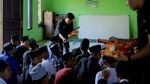 Kala Komunitas Motor Berbagi Keceriaan dengan Sesama