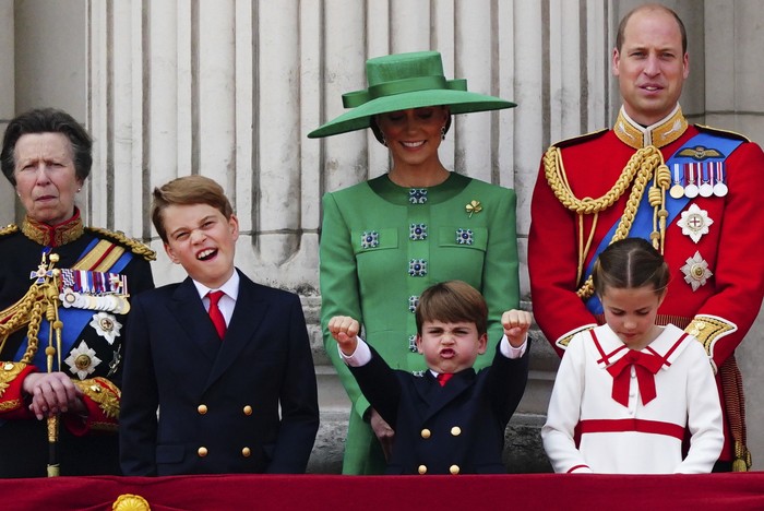 From left, Britain's Princess Anne, Prince George, Kate, Princess of Wales, Prince Louis, Prince William and Princess Charlotte view the flypast from the balcony of Buckingham Palace following the Trooping the Colour ceremony in central London, Saturday June 17, 2023. (Victoria Jones/PA via AP)
