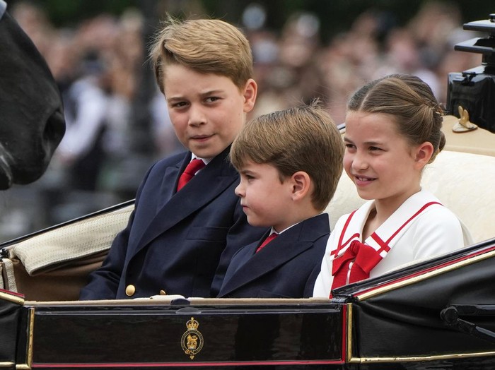 From left: Prince George, Prince Louis and Princess Charlotte leave Buckingham Palace to take part in the Trooping The Colour parade, in London, Saturday, June 17, 2023. Trooping the Colour is the Kings Birthday Parade and one of the nations most impressive and iconic annual events attended by almost every member of the Royal Family.(AP Photo/Alastair Grant)