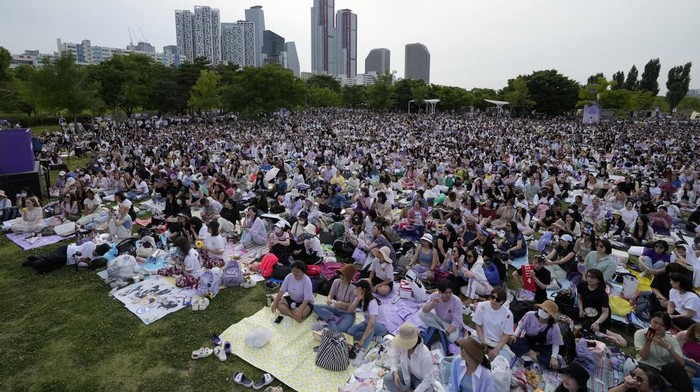 Firework explode over the Han River during an event to celebrate the 10th debut anniversary of K-pop band BTS in Seoul, South Korea, Saturday, June 17, 2023. (AP Photo/Lee Jin-man)