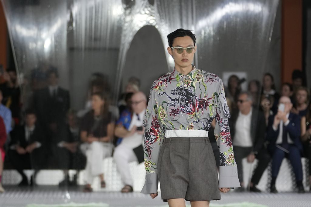 A model wears a creation as part of the Prada men's Spring Summer 2024 collection presented in Milan, Italy, Sunday, June 18, 2023. (AP Photo/Luca Bruno)