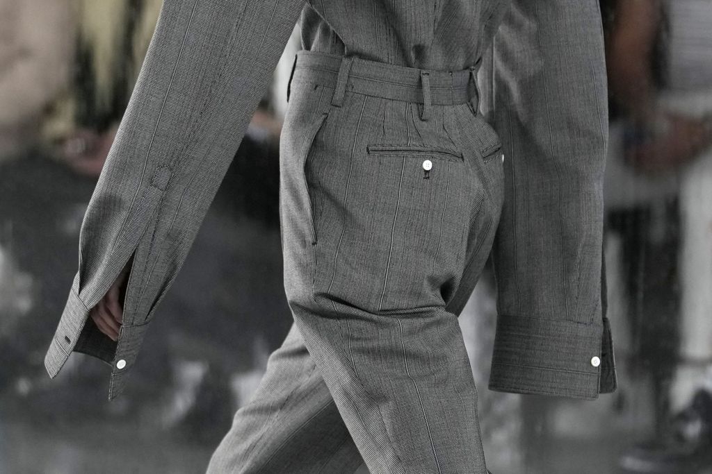 A model wears a creation as part of the Prada men's Spring Summer 2024 collection presented in Milan, Italy, Sunday, June 18, 2023. (AP Photo/Luca Bruno)