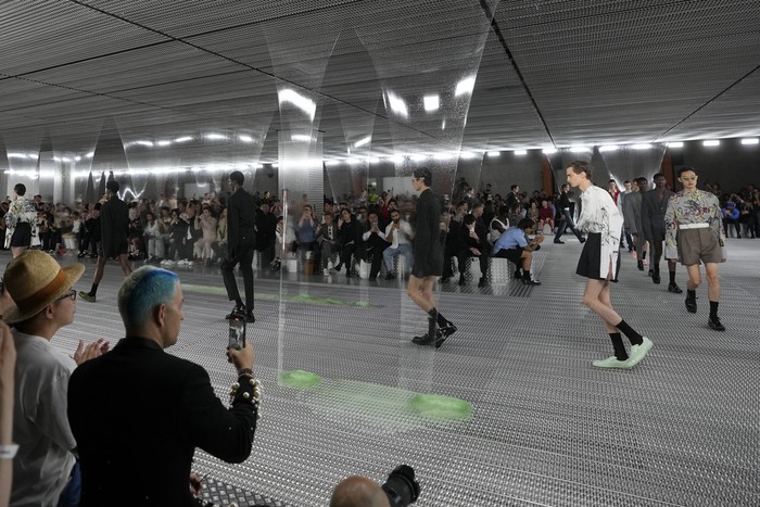 A model wears a creation as part of the Prada mens Spring Summer 2024 collection presented in Milan, Italy, Sunday, June 18, 2023. (AP Photo/Luca Bruno)