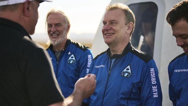 In this photo provided by Blue Origin, NS-21 (New Shepard-21), astronaut Hamish Harding receives his Blue Origin astronaut pin after a successful flight to space on June 4, 2022, in Van Horn, Texas. According to Action Aviation, a company for which Harding serves as chairman, the U.K. businessman was one of the mission specialists onboard a missing submersible carrying five people to view the wreckage of the Titanic that was reported overdue late Sunday, June 18, 2023. (Felix Kunze/Blue Origin via AP)