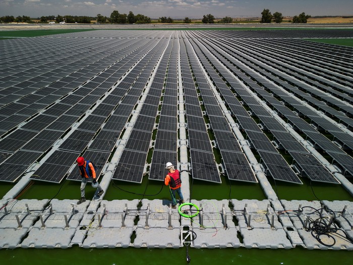 An aerial view shows solar panels, installed by Nofar Energy, on the rooftops of cowsheds and chicken coops in Kibbutz Or HaNer, Israel June 19, 2023. REUTERS/Amir Cohen