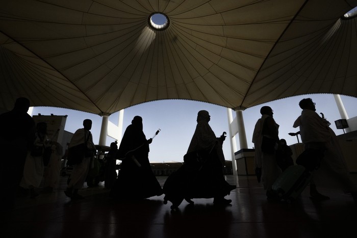 Pilgrims arrive at the Hajj terminal at King Abdulaziz International Airport in Jeddah, Saudi Arabia, Tuesday, June 20, 2023. Hundreds of thousands of Muslims have arrived in the kingdom to participate in the annual Hajj pilgrimage, a ritual required of all able-bodied Muslims at least once in their life. (AP Photo/Amr Nabil)