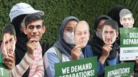 Dalam aksinya mereka membentangkan spanduk tuntutan dan poster terkait materi demo. Selain itu, sebagian pendemo mengenakan topeng bergambar pimpinan negara-negara G7. 