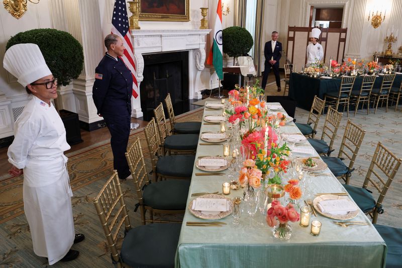 White House Executive Chef Cristeta Comerford and Guest Chef Nina Curtis pose as they present dishes from the menu during a media preview in advance of Thursday's State Dinner as part of Indian Prime Minister Narendra Modi's official visit to the United States, in the State Dining Room of the White House in Washington, U.S., June 21, 2023. REUTERS/Evelyn Hockstein