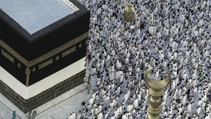 Muslim pilgrims circumambulate around the Kaaba, the cubic building at the Grand Mosque, during the annual Hajj pilgrimage in Mecca, Saudi Arabia, Thursday, June 22, 2023. Muslim pilgrims are converging on Saudi Arabia's holy city of Mecca for the largest Hajj since the coronavirus pandemic severely curtailed access to one of Islam's five pillars. (AP Photo/Amr Nabil)