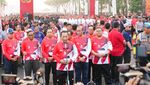 Potret Kapolri hingga Mahfud Md Meriahkan Bhayangkara Fun Walk di Monas