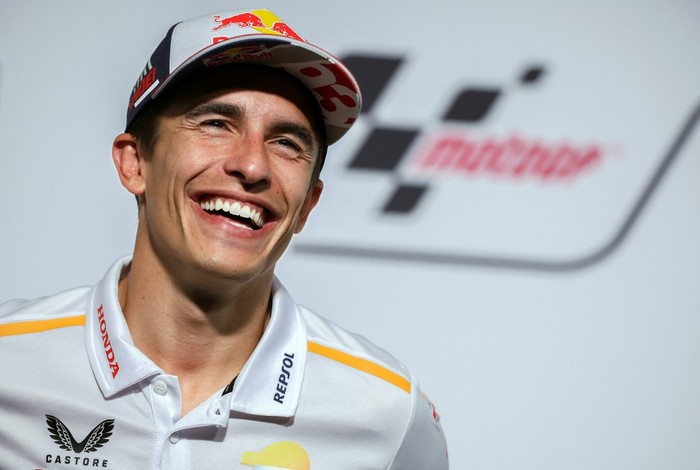 Repsol Honda Teams Spanish rider Marc Marquez smiles during a press conference ahead of the MotoGP German motorcycle Grand Prix at the Sachsenring racing circuit in Hohenstein-Ernstthal near Chemnitz, eastern Germany, on June 15, 2023. (Photo by Ronny Hartmann / AFP)