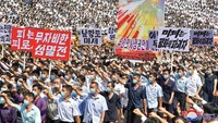 Orang-orang menghadiri rapat umum massal yang mengecam AS di Pyongyang, Korea Utara, 25 Juni 2023 dalam foto yang dirilis oleh Kantor Berita Pusat Korea (KCNA) Korea Utara.