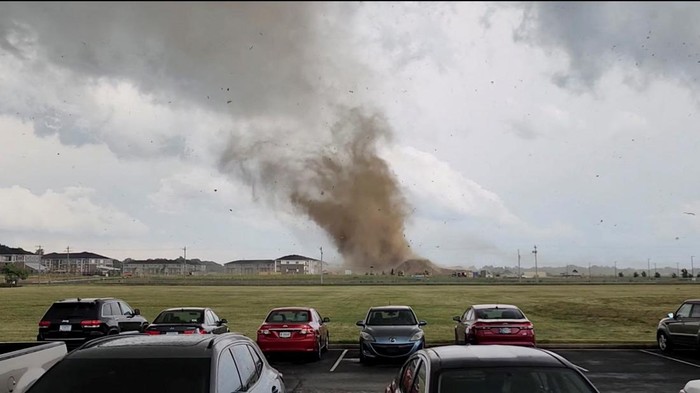 Debris is lifted into the air by a possible tornado during severe weather near Greenwood, Indiana, U.S., June 25, 2023 in this screen grab obtained from a social media video. Eric Ford via TMX/via REUTERS  THIS IMAGE HAS BEEN SUPPLIED BY A THIRD PARTY. MANDATORY CREDIT. NO RESALES. NO ARCHIVES.