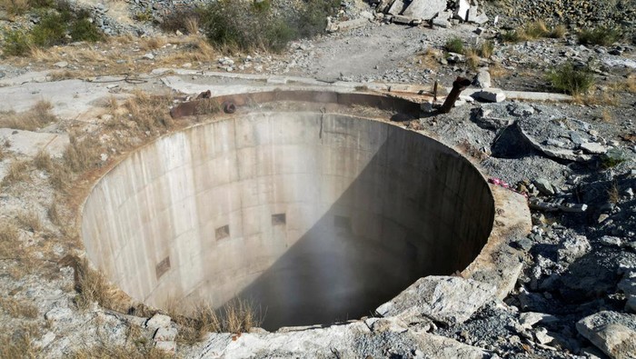 View of an abandoned mine shaft where 31 illegal miners are thought to have died due to a suspected methane gas leak, at Virginia mine, near Welkom, South Africa, June 26, 2023. REUTERS/Shafiek Tassiem REFILE - CORRECTING INFORMATION