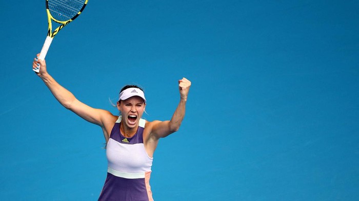 FILE PHOTO: Tennis - Australian Open - Second Round - Melbourne Park, Melbourne, Australia - January 22, 2020 Denmarks Caroline Wozniacki celebrates winning the match against Ukraines Dayana Yastremska REUTERS/Hannah Mckay/File Photo
